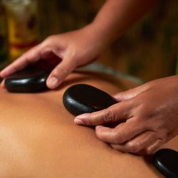 The master does back massage with special stones, spa treatments, magnets